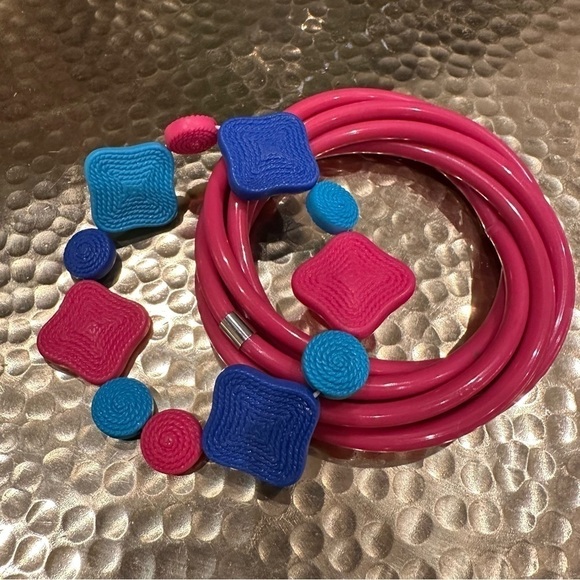 Jewelry - Vintage 80s rad pair of hot pink and blue plastic bracelets